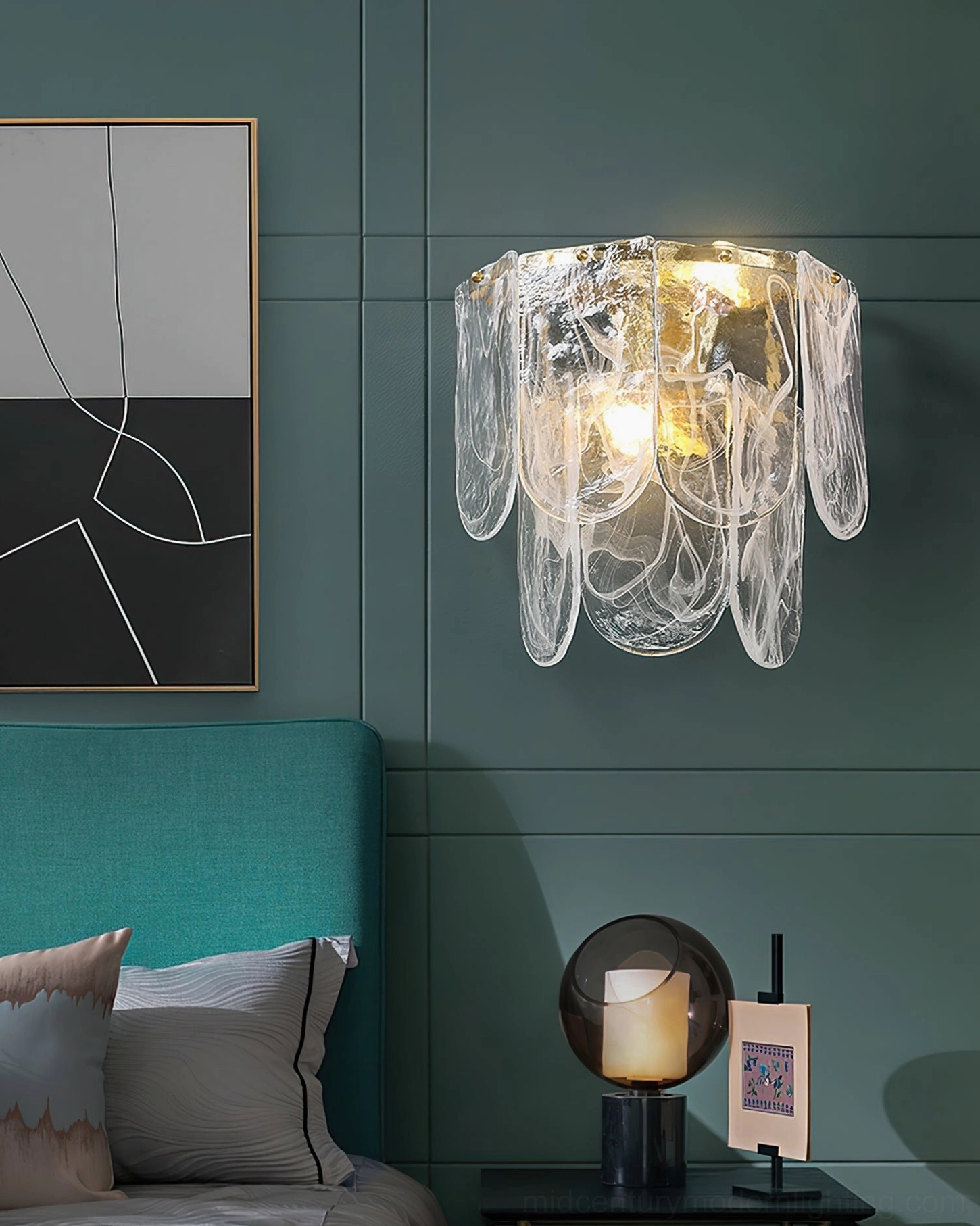 Nason brass wall sconce in minimalist modern bedroom with teal headboard wall, subtle wall art and table lamp