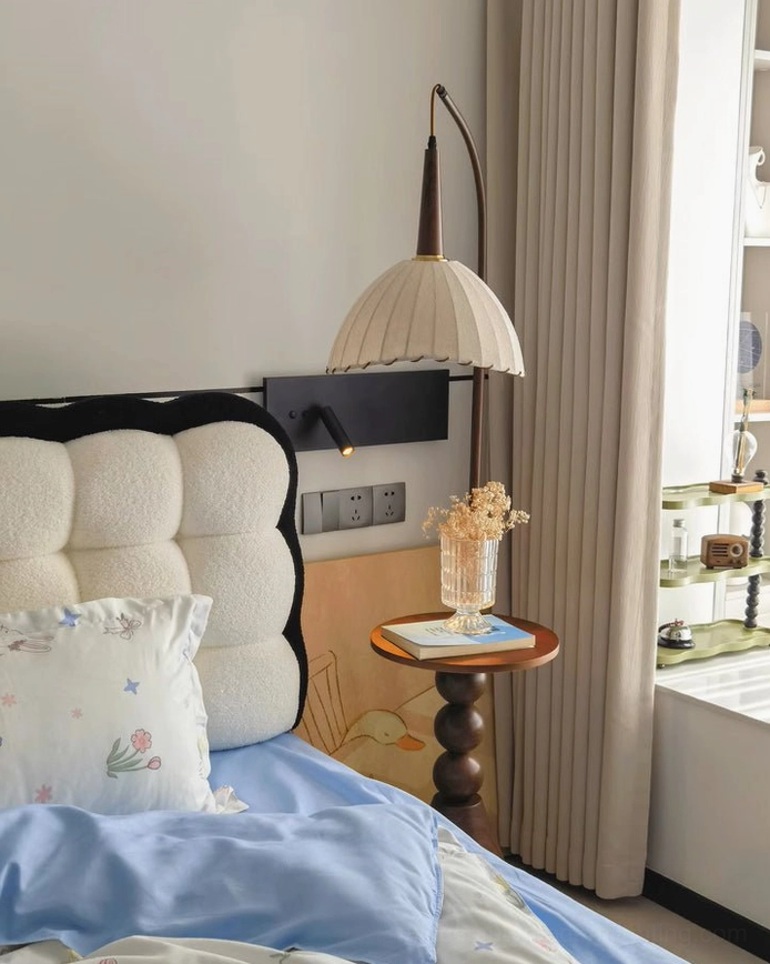 Naumy floor lamp with wooden base showing linen and walnut finish options in contemporary interior
