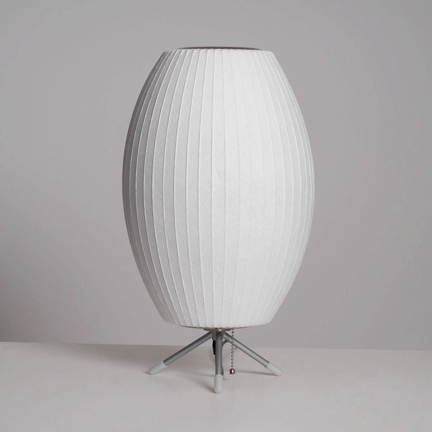 George Nelson Model A bubble lamp paired with modern furniture arrangement