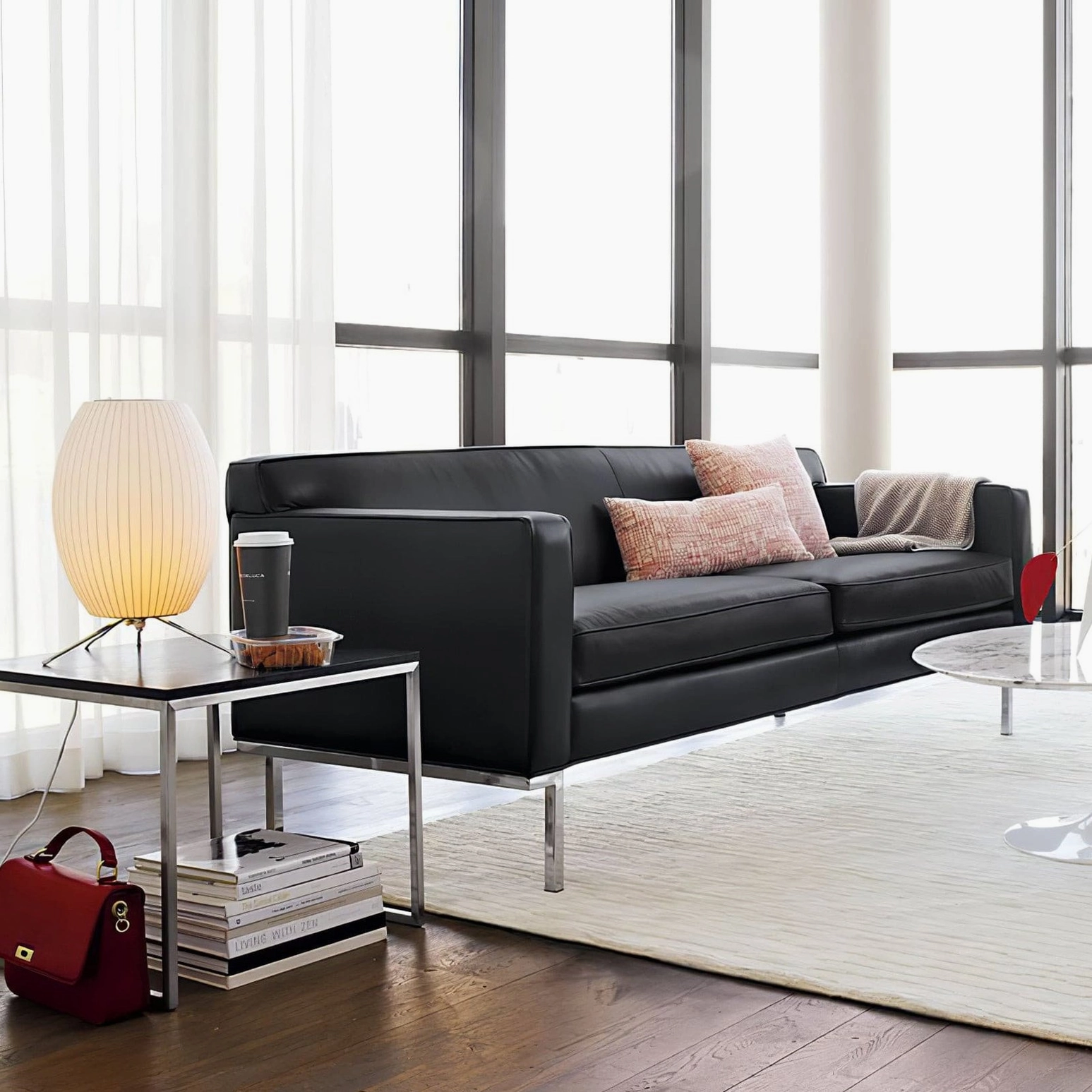 George Nelson bubble table lamp with organic spherical shape and steel wire tripod base