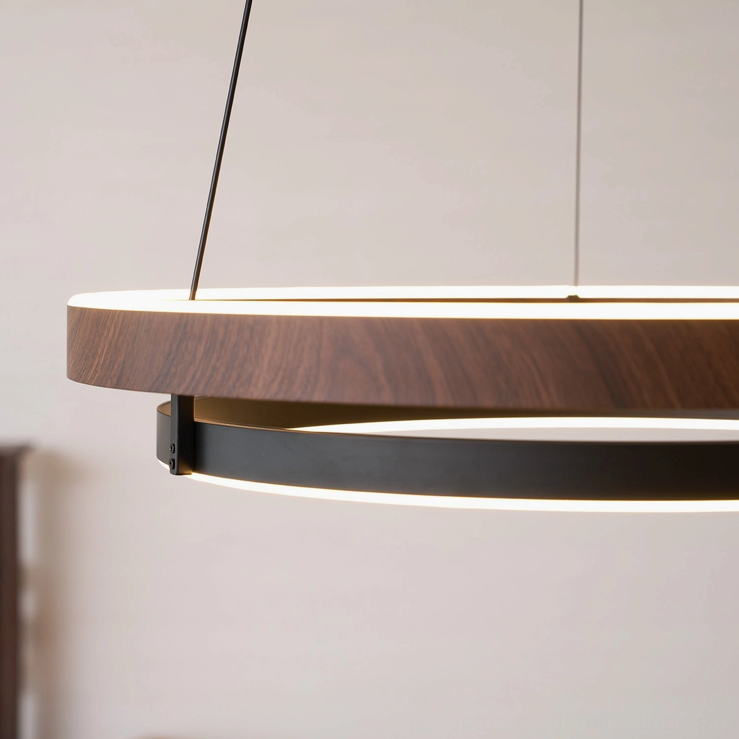 Niseko chandelier bottom view showing integrated LED warm light output and geometric rings
