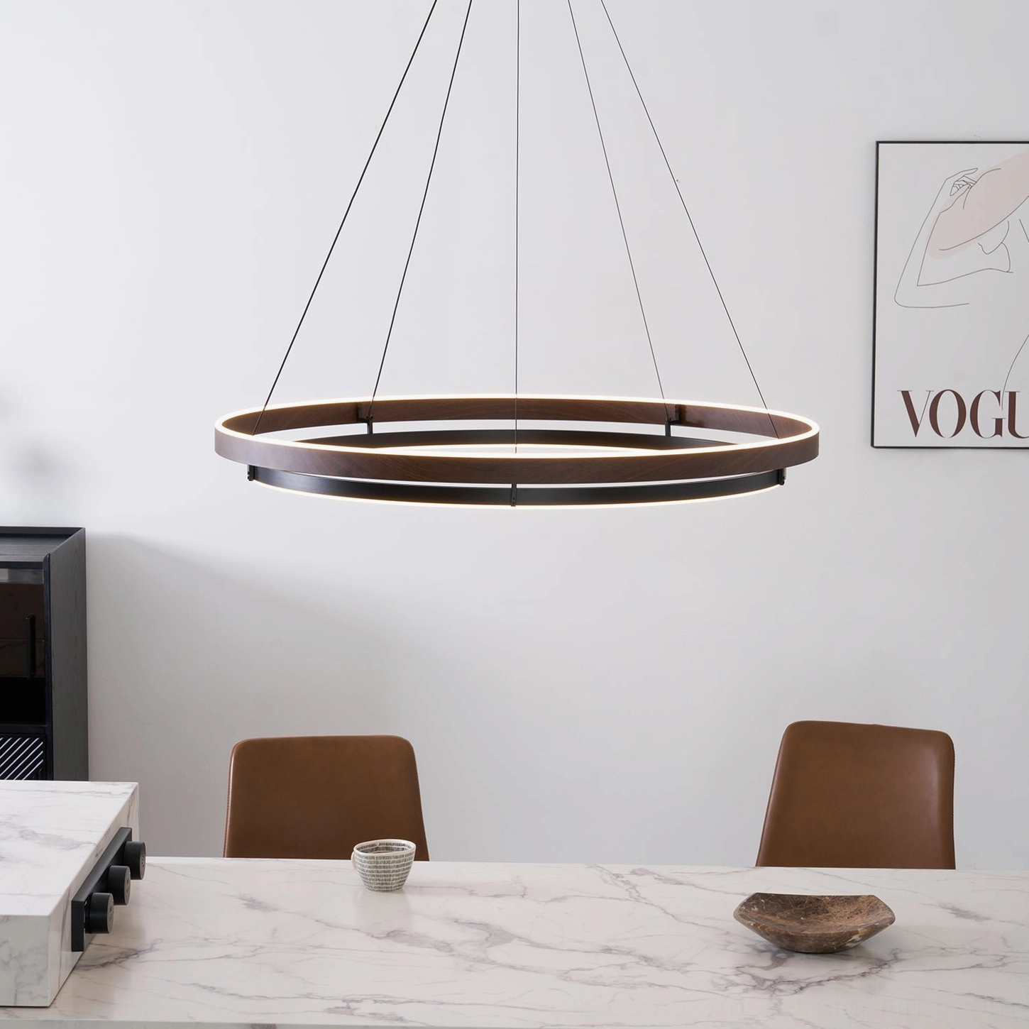 Niseko chandelier medium size installed in dining space showing proper proportions and hanging height