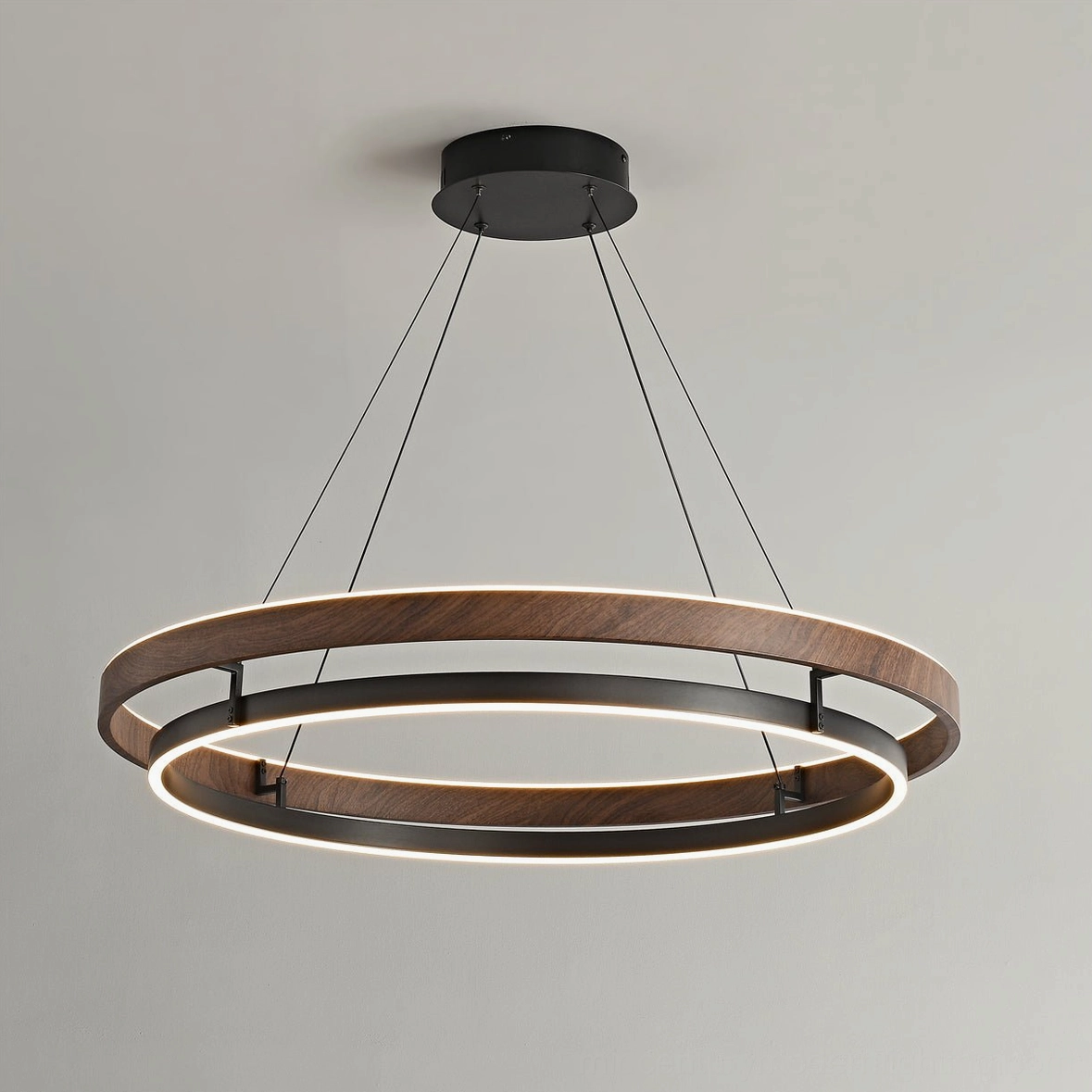 Niseko double-ring pendant light geometric design detail showing sculptural silhouette against white background