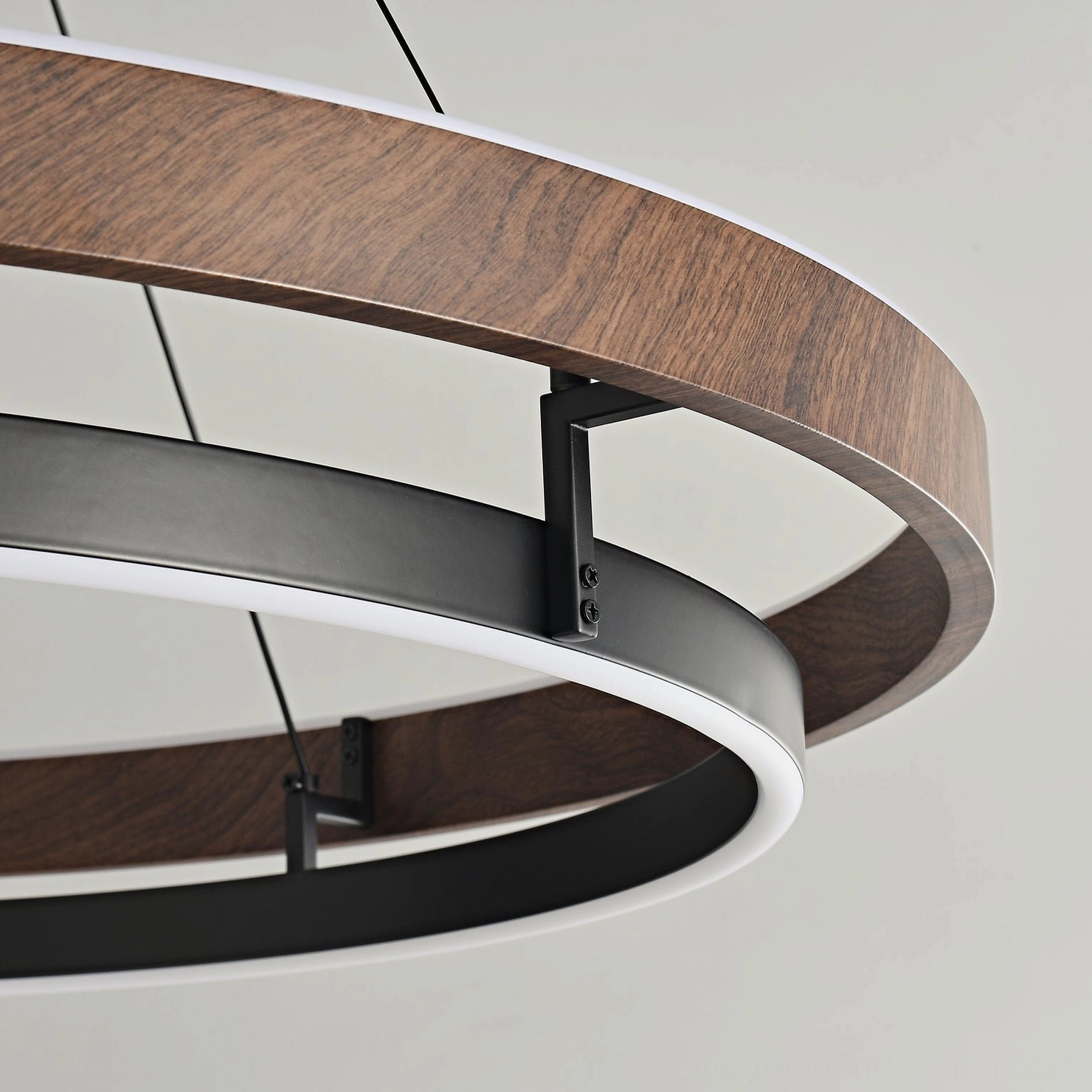 Niseko pendant light fixture showing integrated LED warm glow and sculptural double-ring form