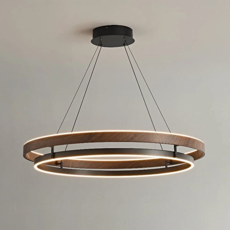 Niseko double-ring pendant in modern minimalist space with clean lines and warm neutral color scheme