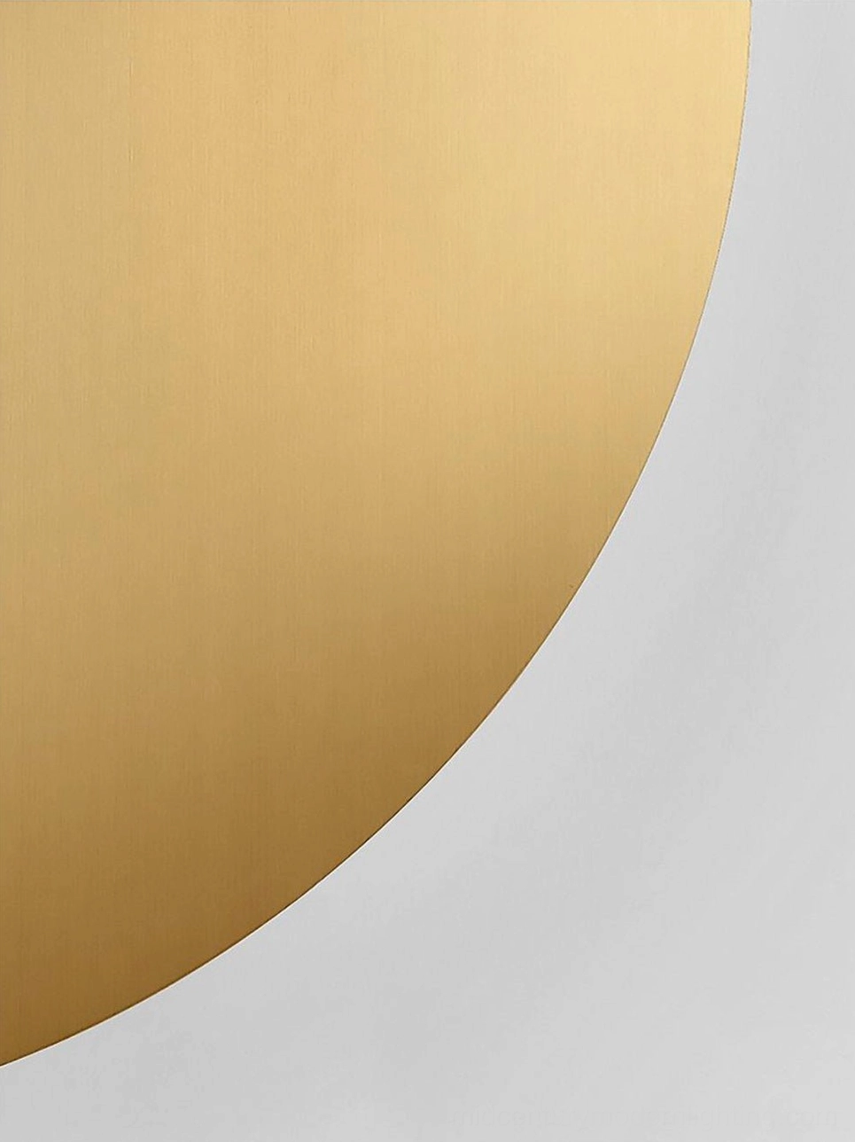 Macro close-up of Nodes lamp base texture showing brushed metal finish and curved minimalist mounting bracket