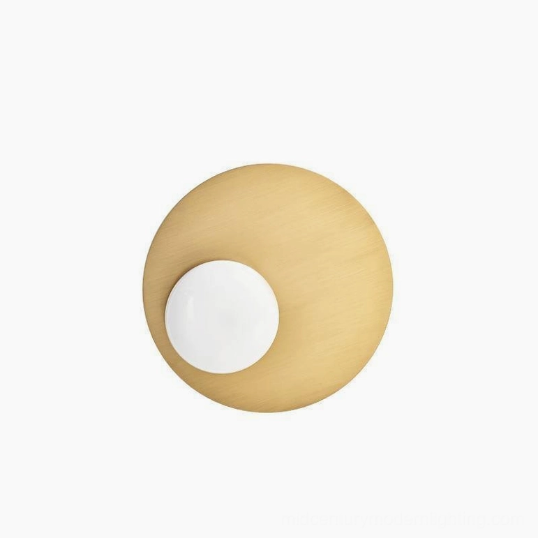 Single Nodes angled wall lamp with warm brass finish and spherical frosted milk glass shade front view