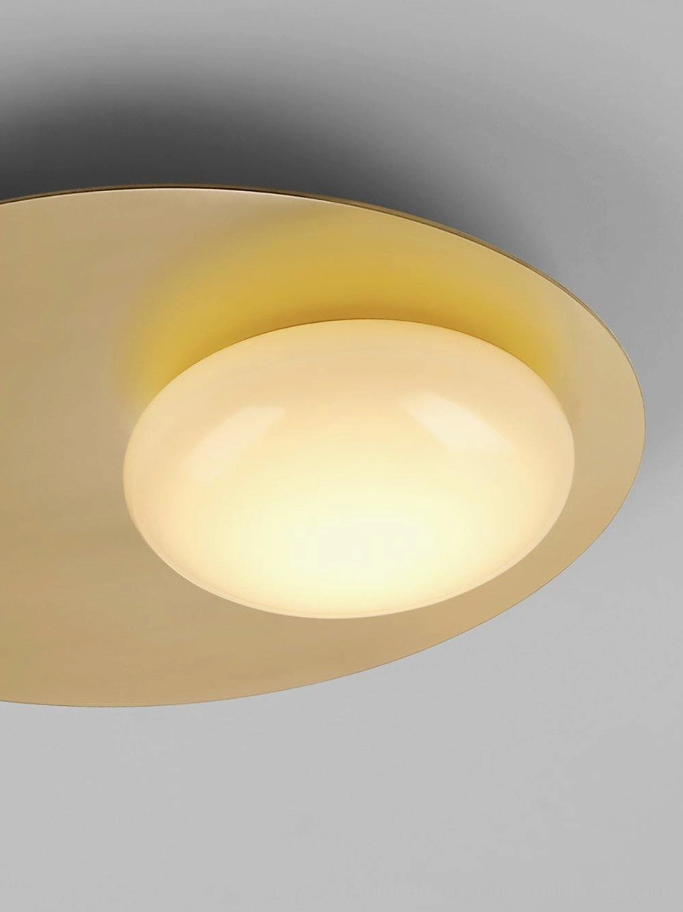 Nodes modern wall lamp black finish three-quarter view showing sculptural metal form and glass sphere