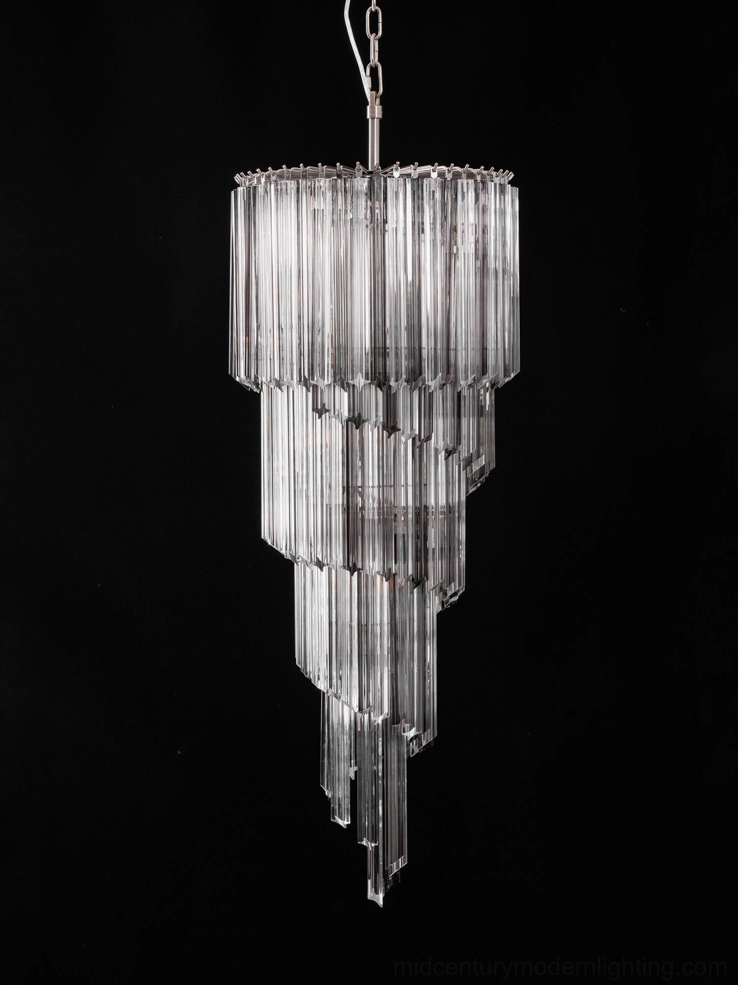 Noir spiral chandelier in residential setting showing integration with modern interior design elements