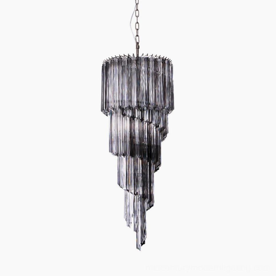 Noir spiral chandelier with precision-cut smoke gray glass tiers, front studio view showing geometric cascade design