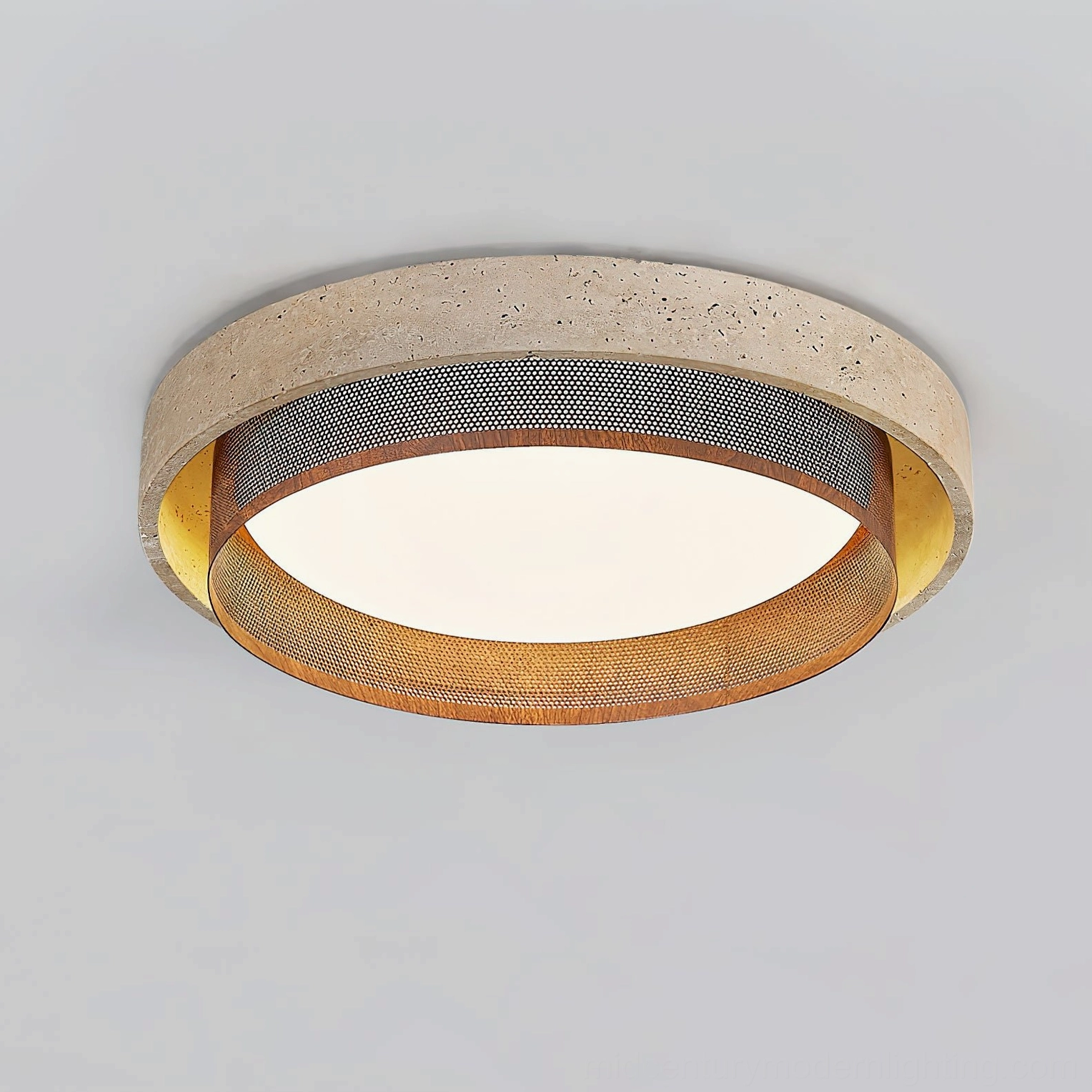 Nolan round flush mount ceiling light low angle oblique view showing textured minimalist design