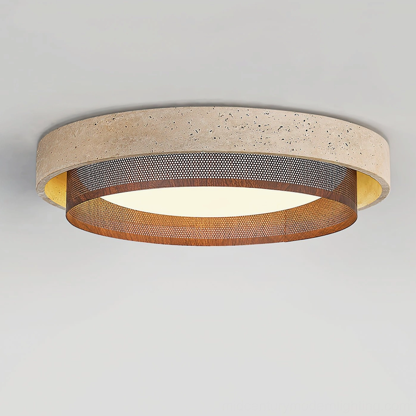 Round travertine ceiling light side angle view showing perforated metal mesh trim layer