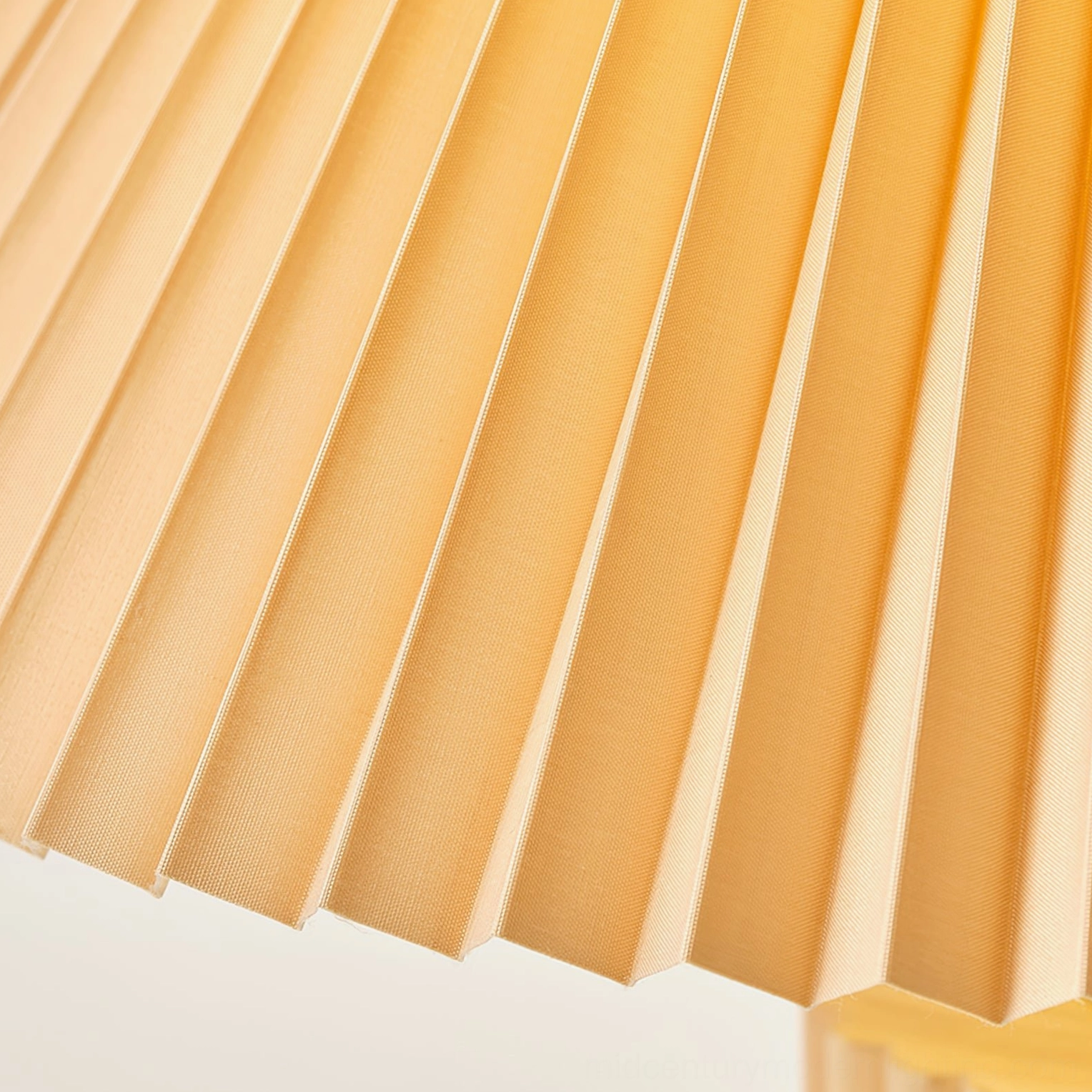 Nora mid-century modern pleated table lamp product shot against neutral background