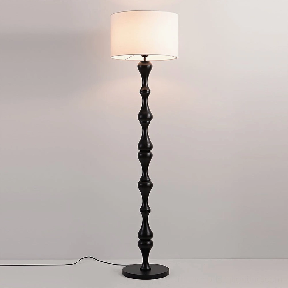 Black Norden floor lamp full view, Scandinavian design carved wooden frame with fabric shade