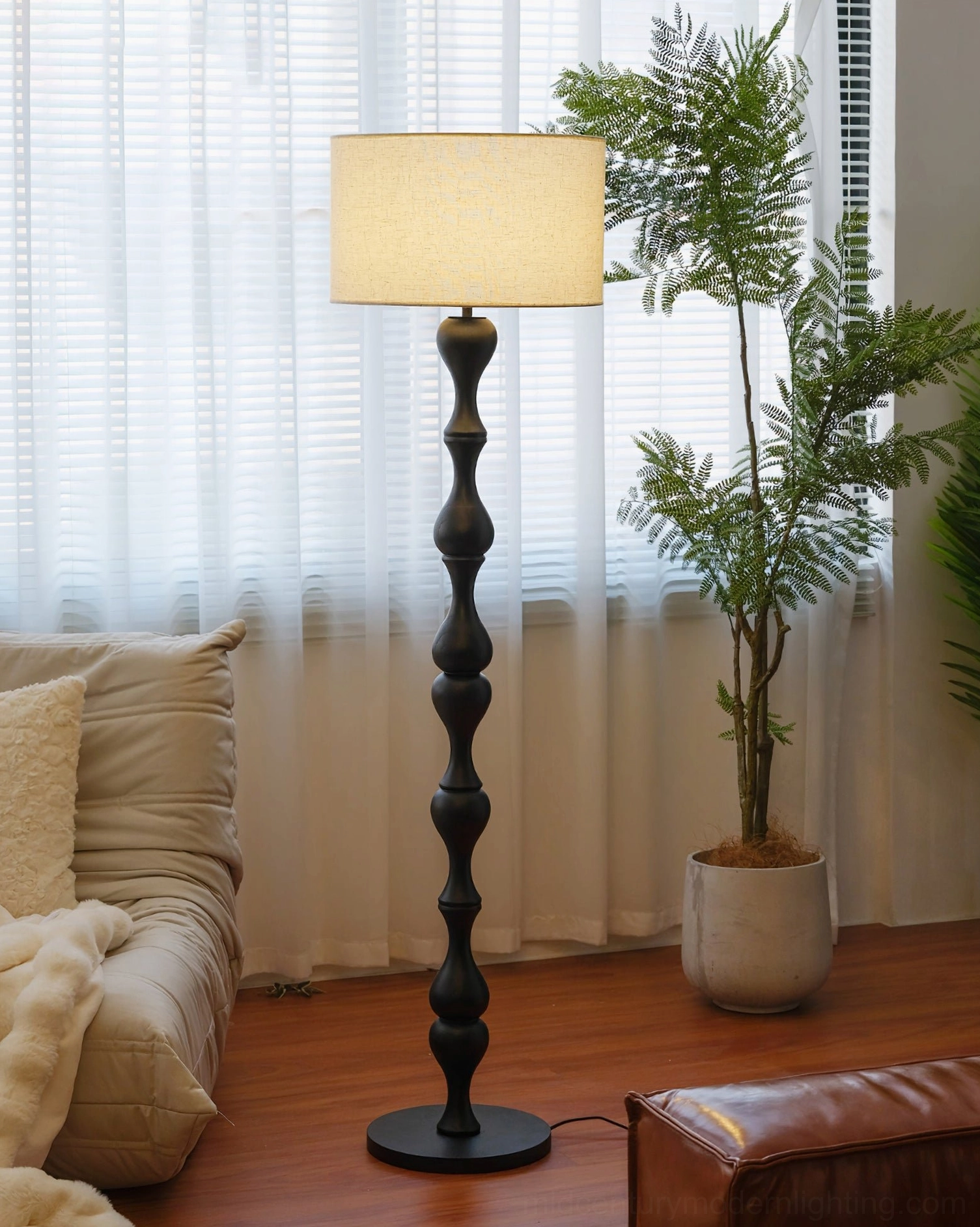 Norden floor lamp minimalist design in black finish, living room ambient lighting with sheer windows