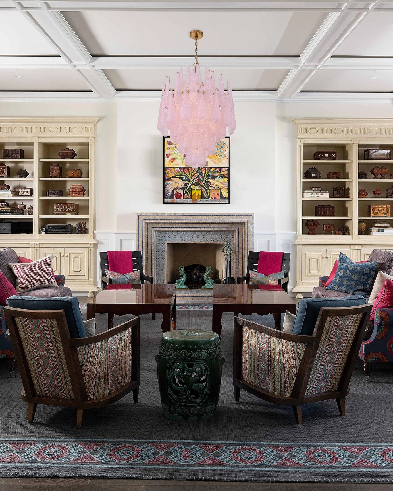 Ollie pink teardrop glass chandelier in traditional formal living room with luxury interior design and classical furnishings