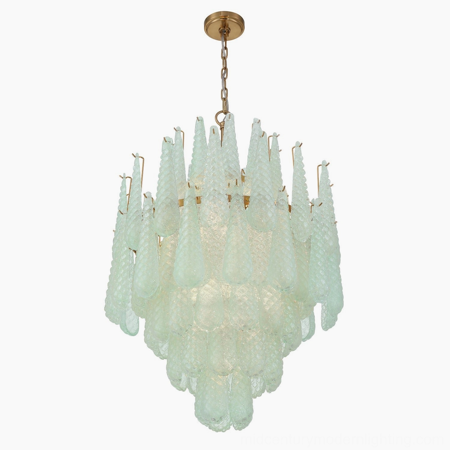 Ollie teardrop chandelier installed in hotel lobby or grand foyer with high ceiling and luxury ambiance