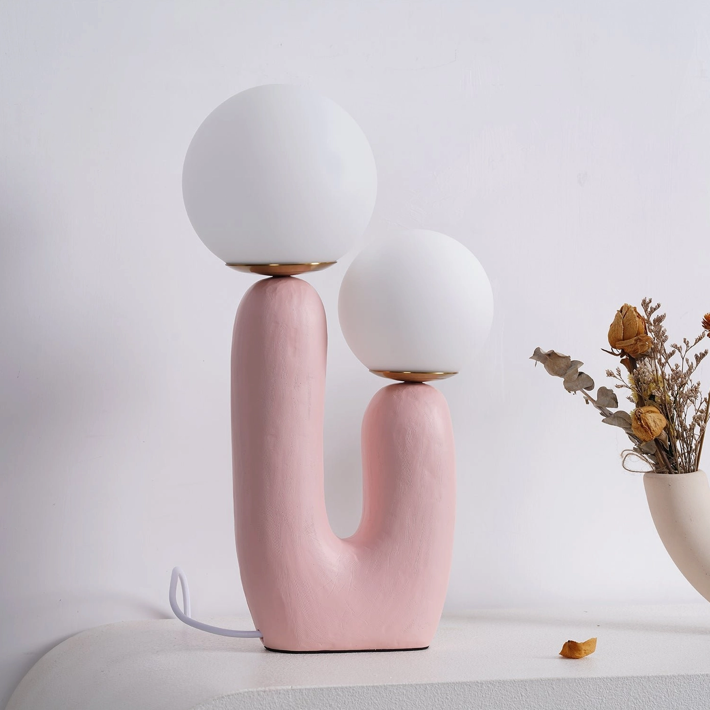 Oo textured ceramic table lamp product shot neutral background