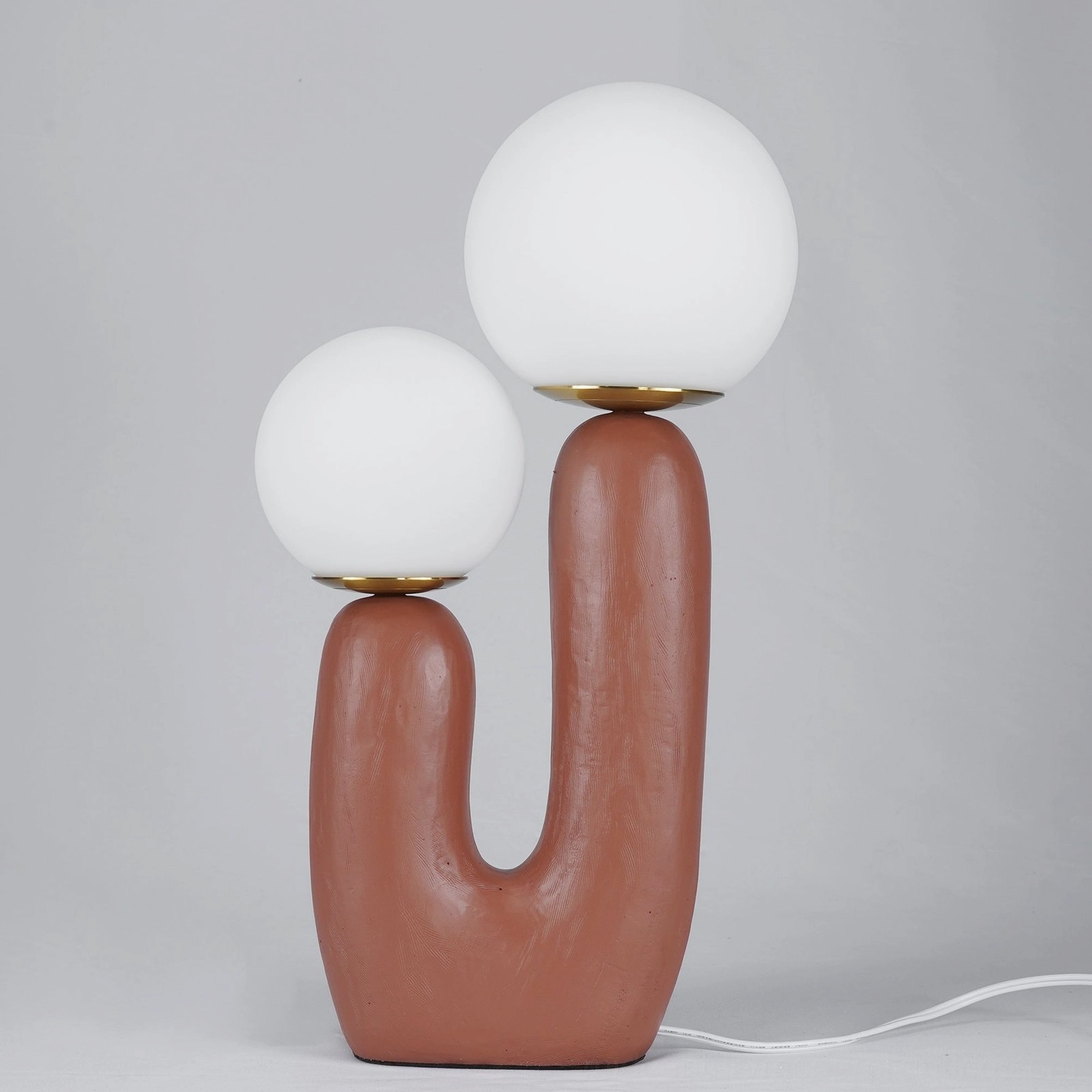 Oo lamp salon style symmetrical arrangement twin lamps