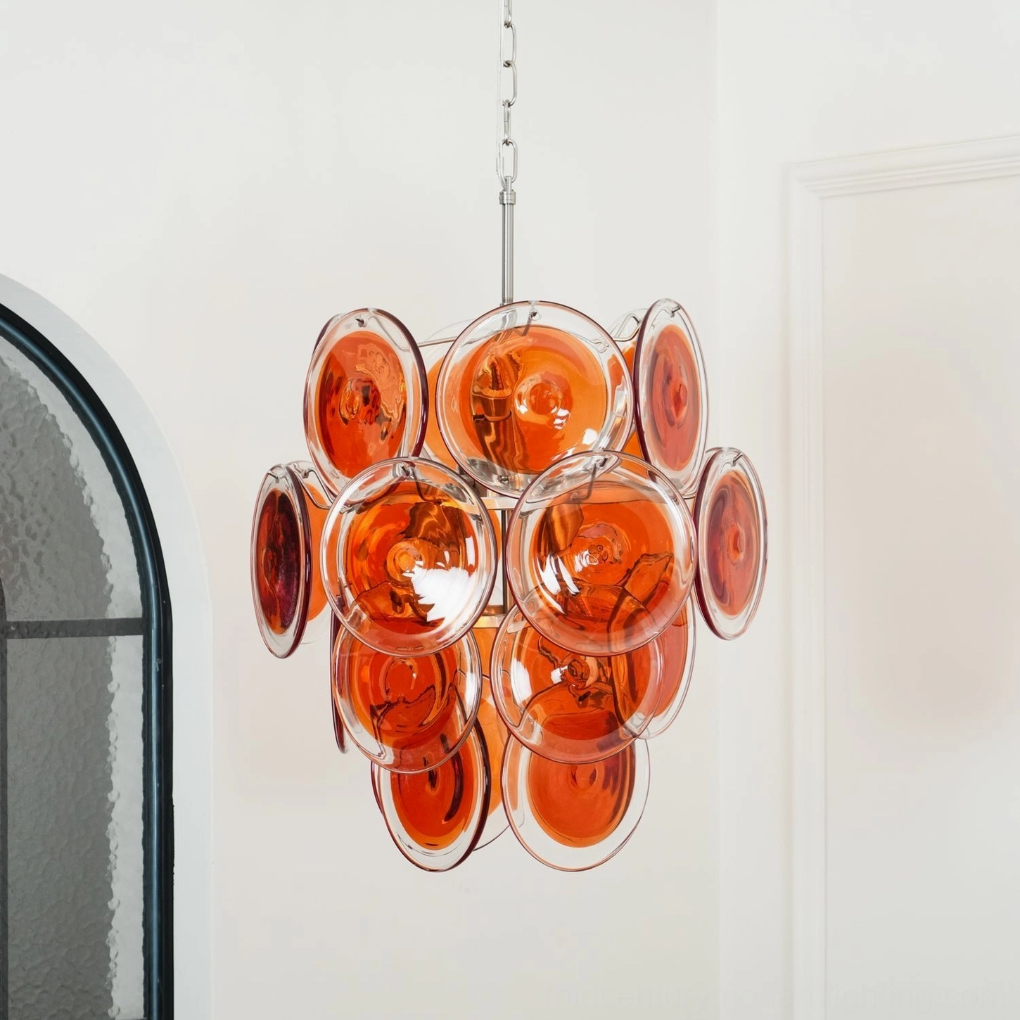 Orange disc Murano chandelier artisan glass craftsmanship mid-century modern