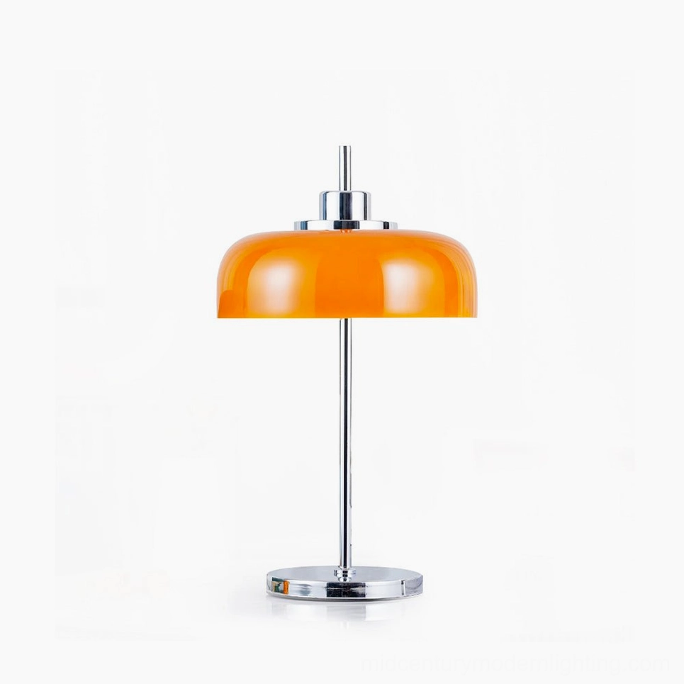 Mid-century modern orange dome table lamp with polished chrome base on white studio background - front view