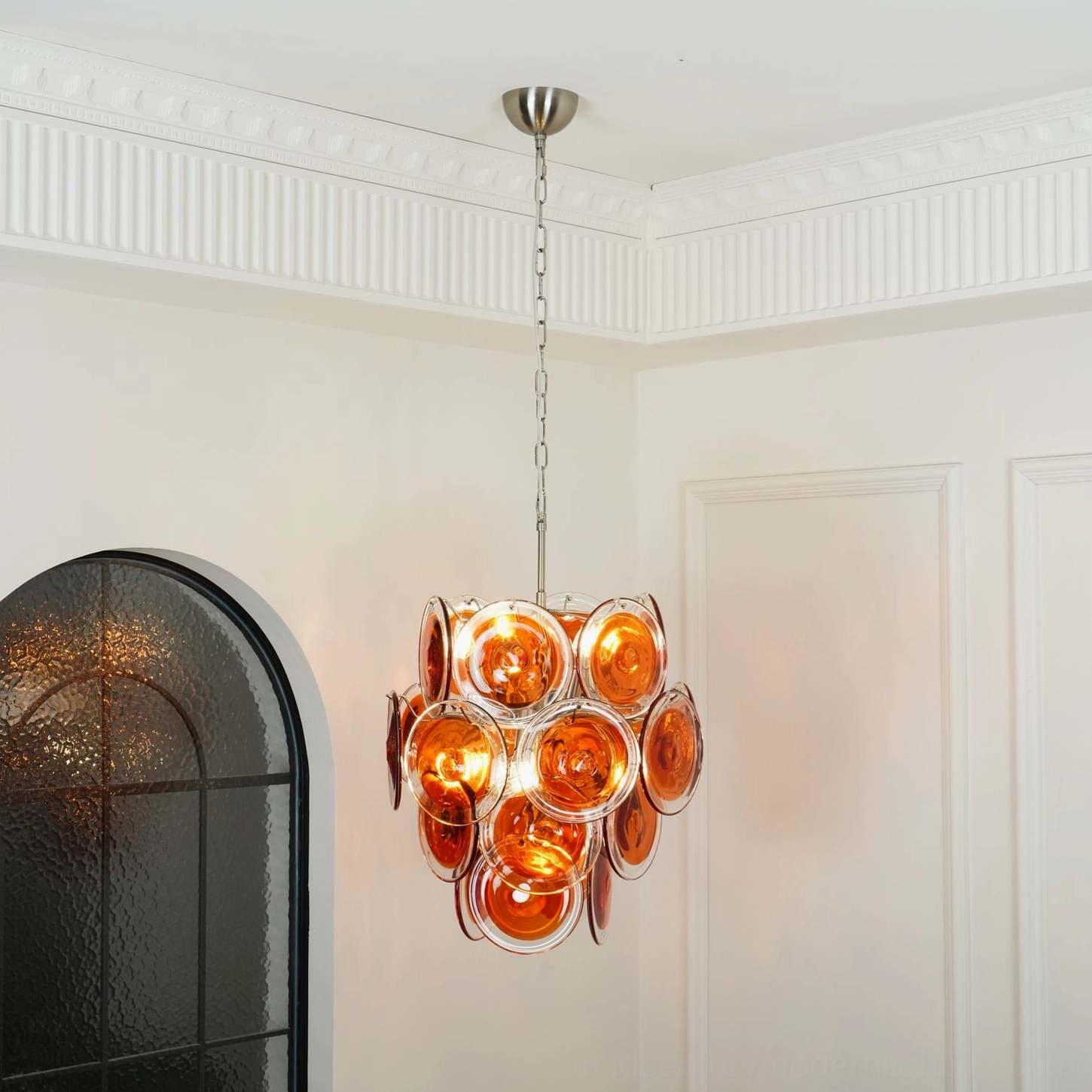 Orange Murano glass chandelier contemporary interior design statement piece
