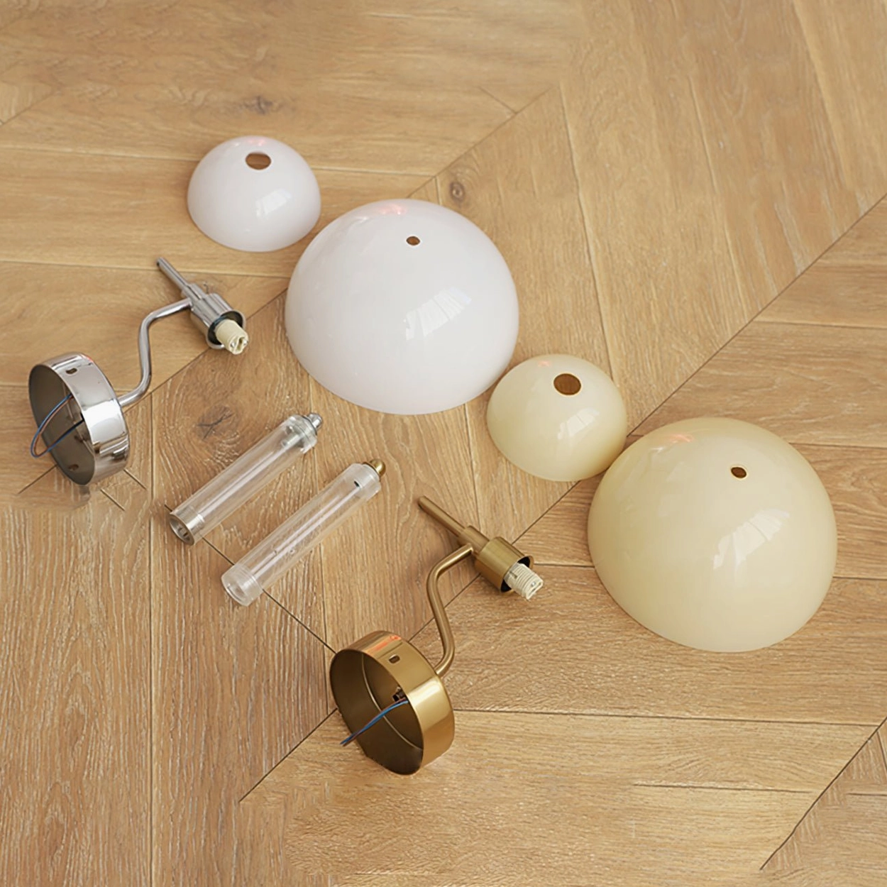 Anchored orb wall lamp showing geometric mushroom silhouette and two-tier glass shade construction