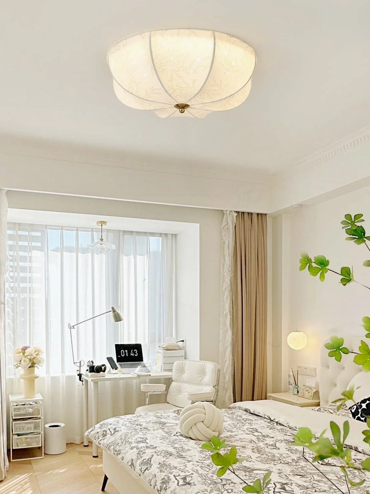 Warm pastoral home study space featuring orchid ceiling light creating refined working ambiance in home office setting