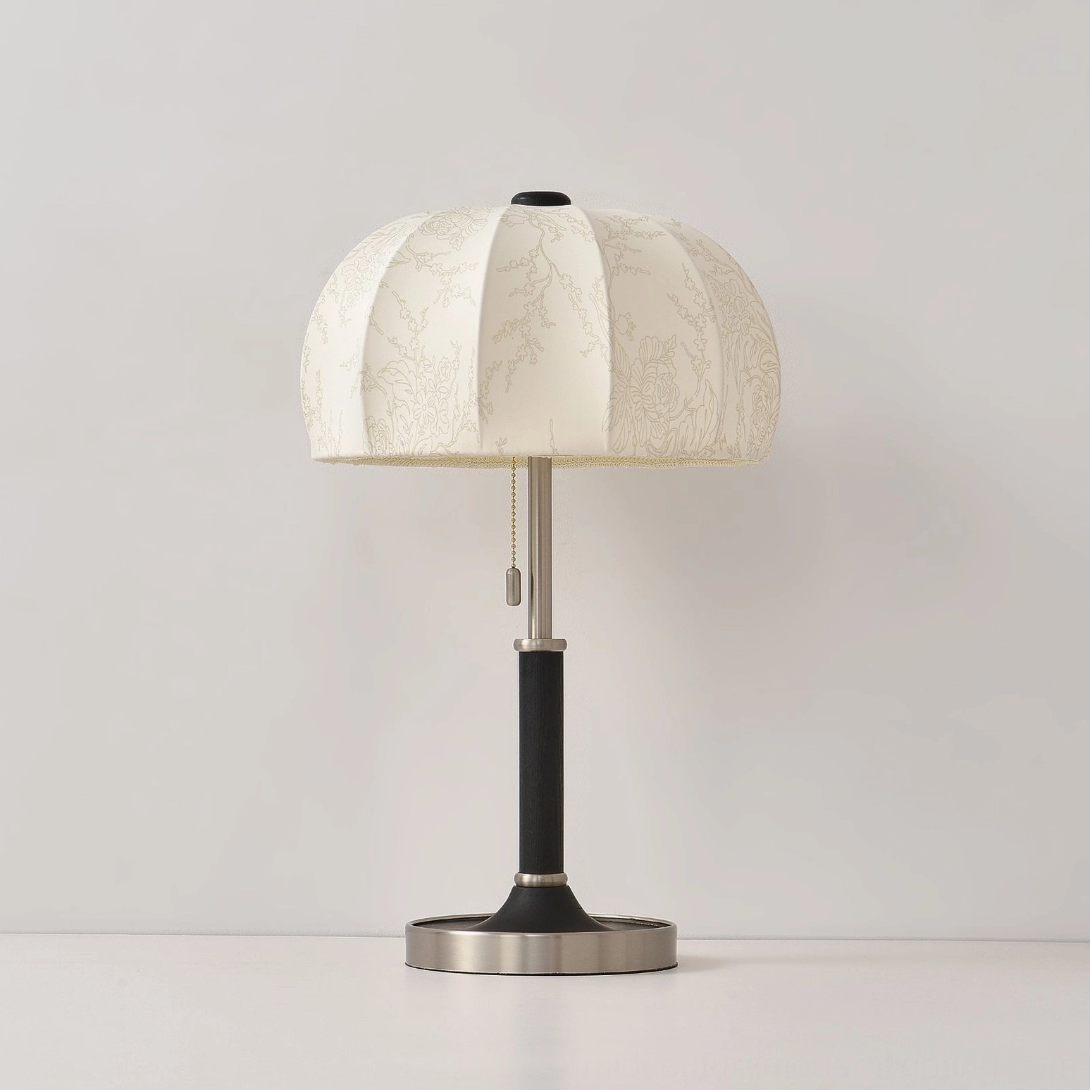 Orchid table lamp in gold finish showing warm opulent aesthetic