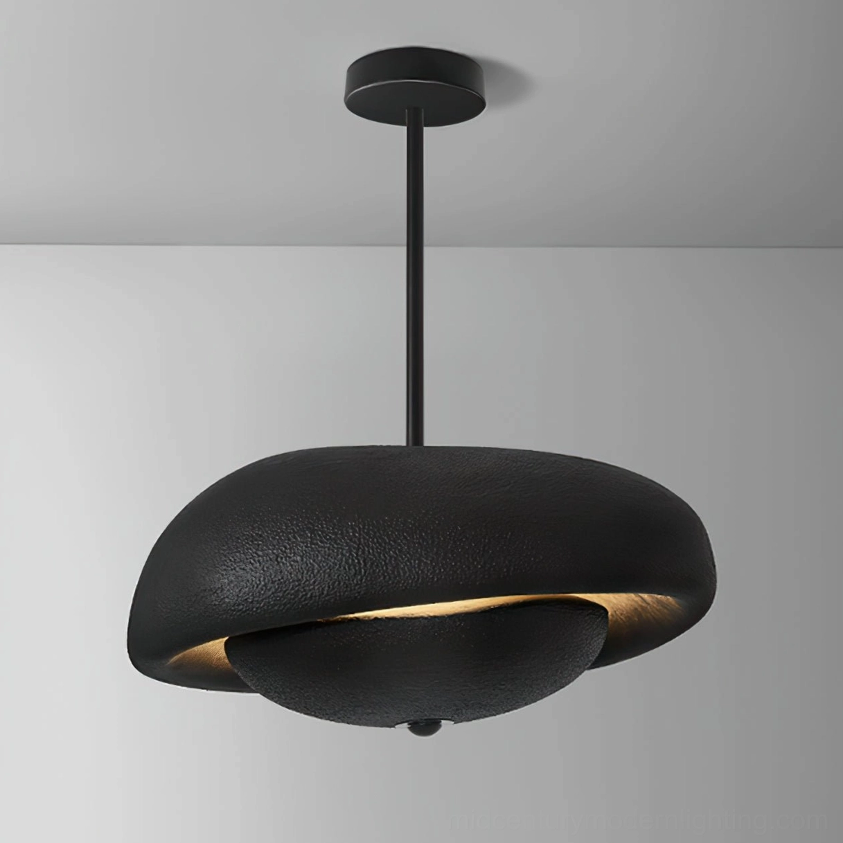 Organic cloud-shaped resin pendant lamp demonstrating asymmetrical wabi-sabi design principles
