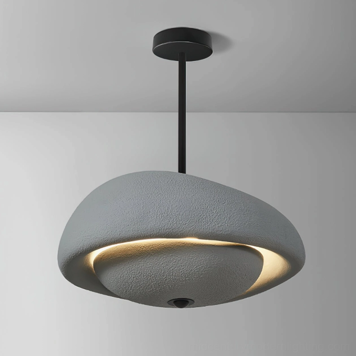 Modern resin sculptural pendant light with organic cloud design suitable for contemporary interiors
