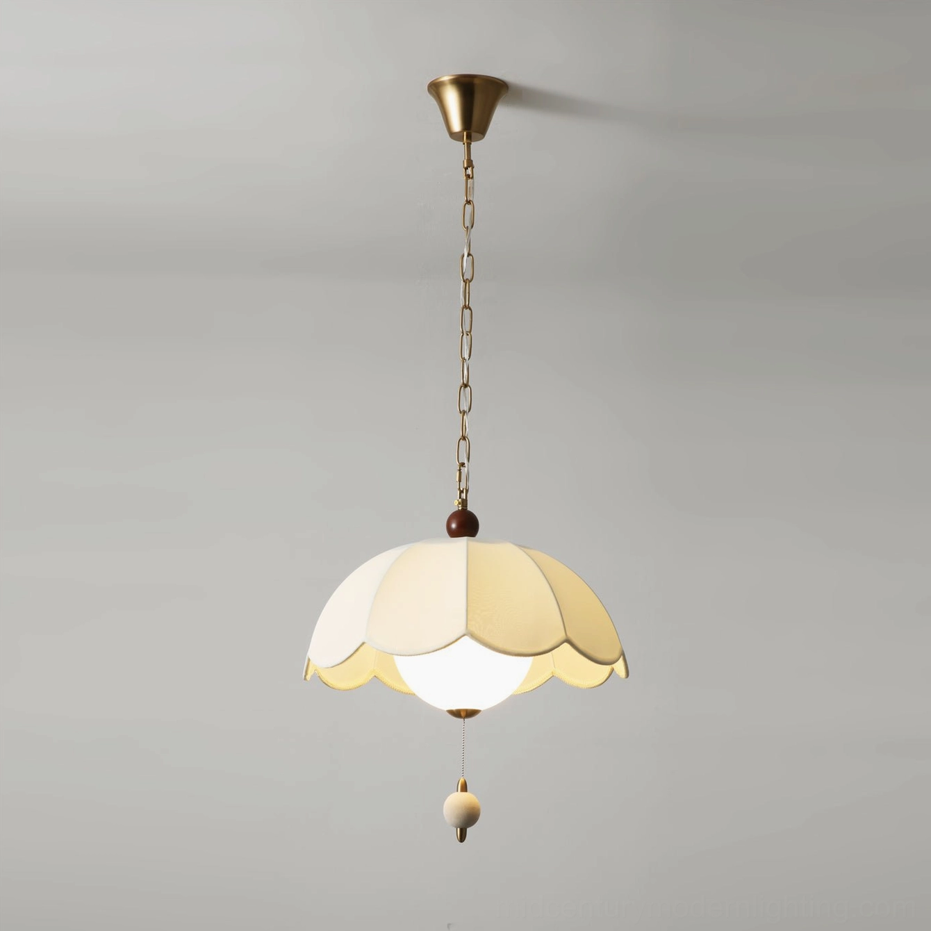 Oriente scalloped pendant light with fabric shade diffusion and warm light effect