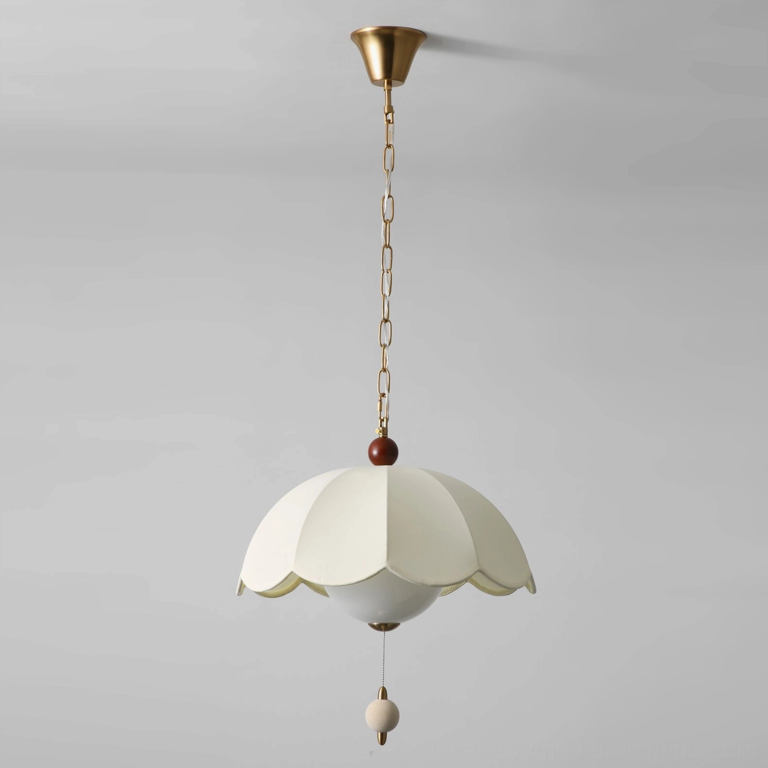 Oriente scalloped pendant light with layered fabric shade and vintage-inspired design aesthetic