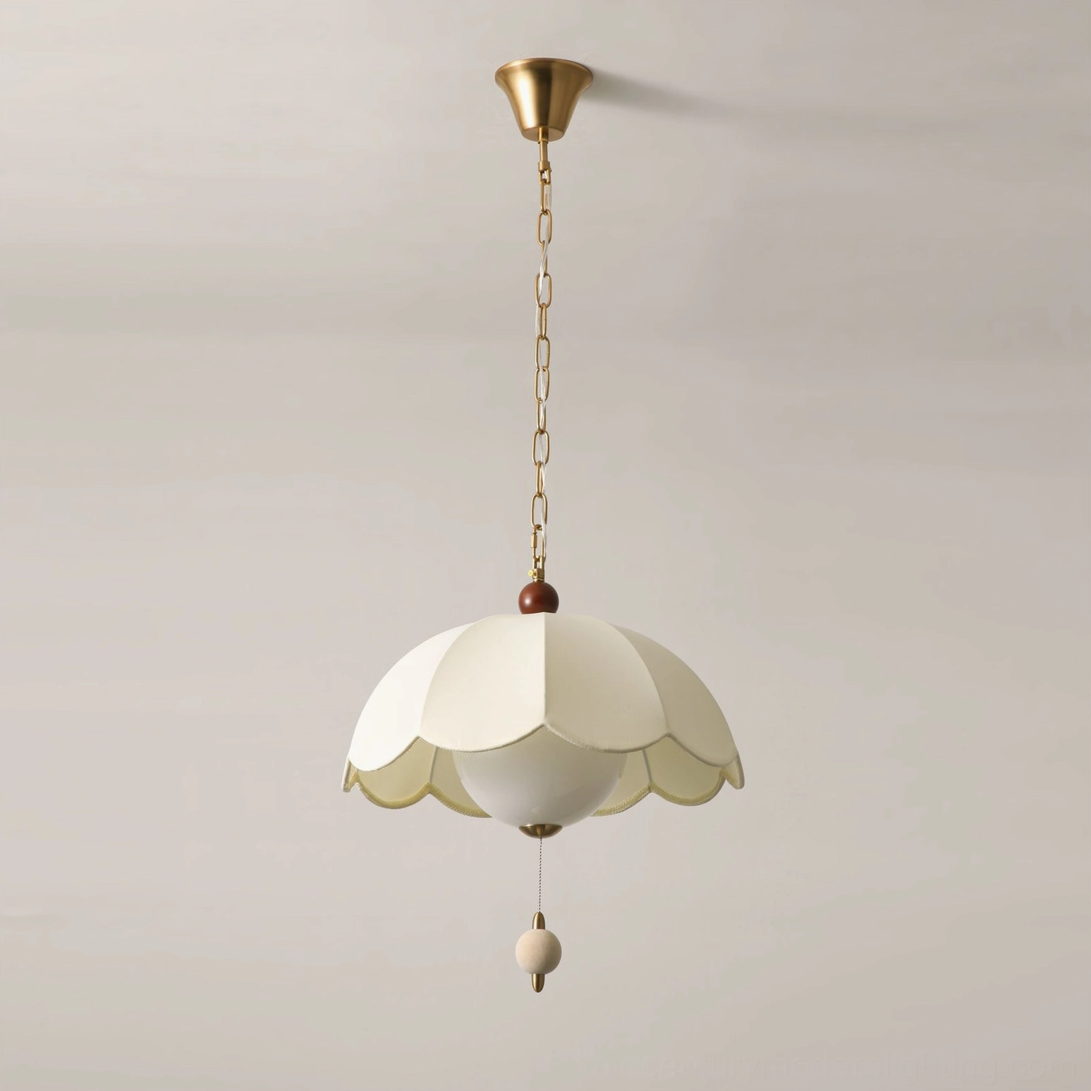 Oriente fabric pendant light with off-white scalloped shade and wooden top accent, gray background