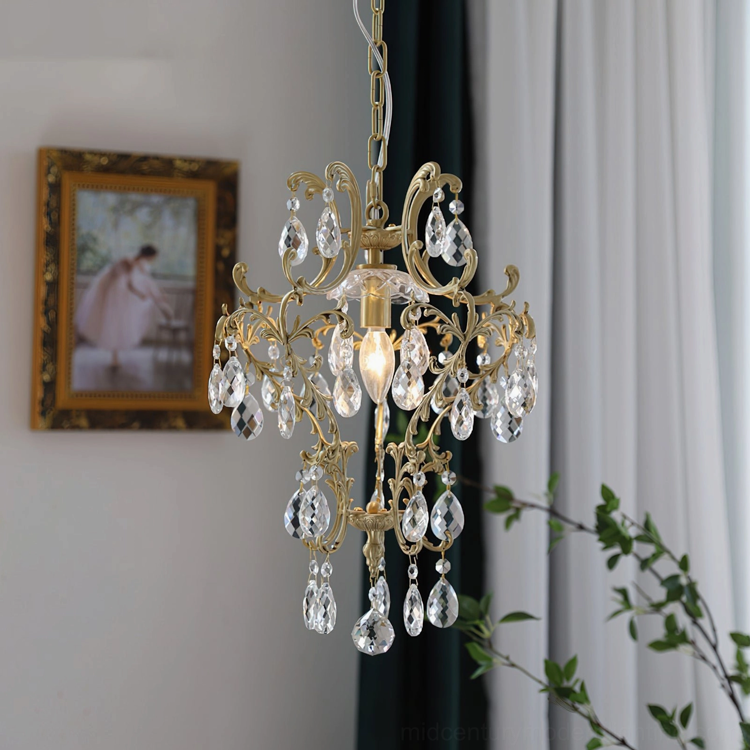 Ornate birdcage pendant with clear crystal drops and intricate brass frame lighting design showcase