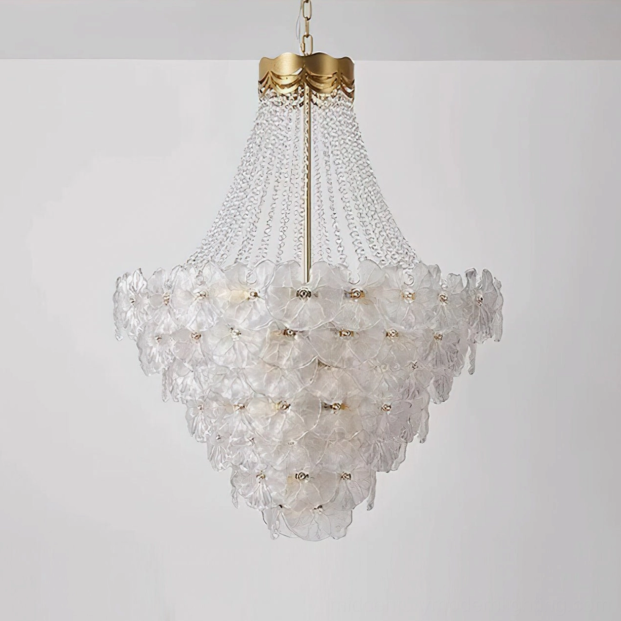 Ornate crystal glass chandelier emphasizing layered architectural design and refined metalwork details