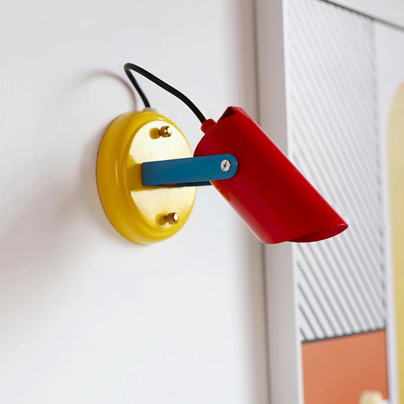 Orno wall spotlight corner placement view showing smooth metal finish hardware within decorated home interior