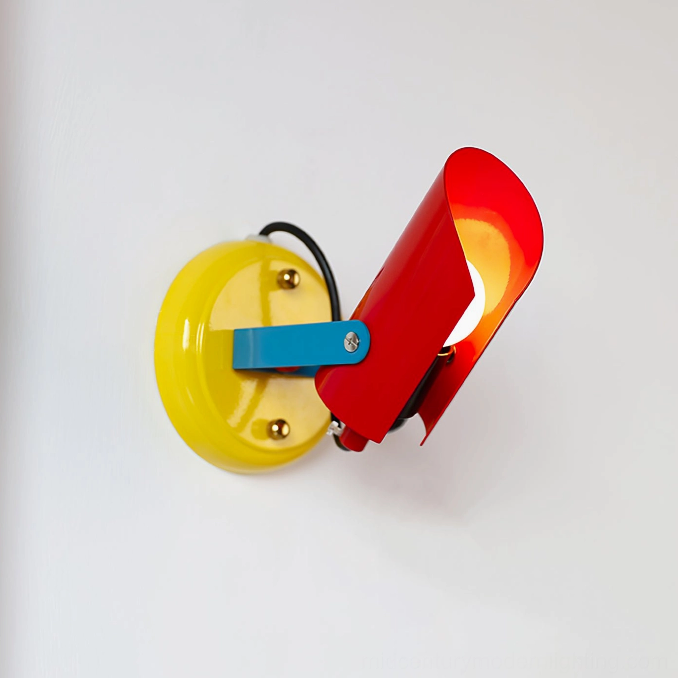 Orno wall spotlight front side view with shade open displaying illuminated light emission against plain wall