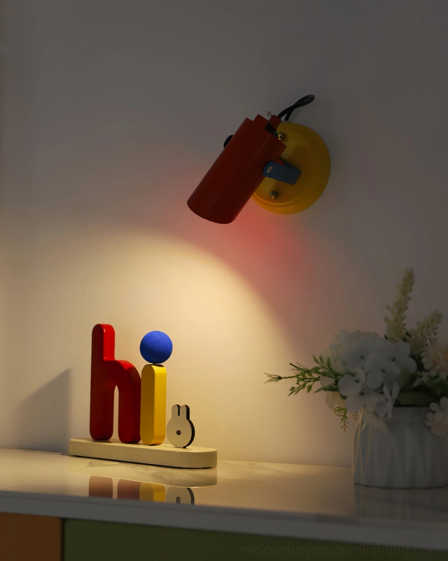 Orno wall lamp studio product photography white background showing adjustable arm and color-block design