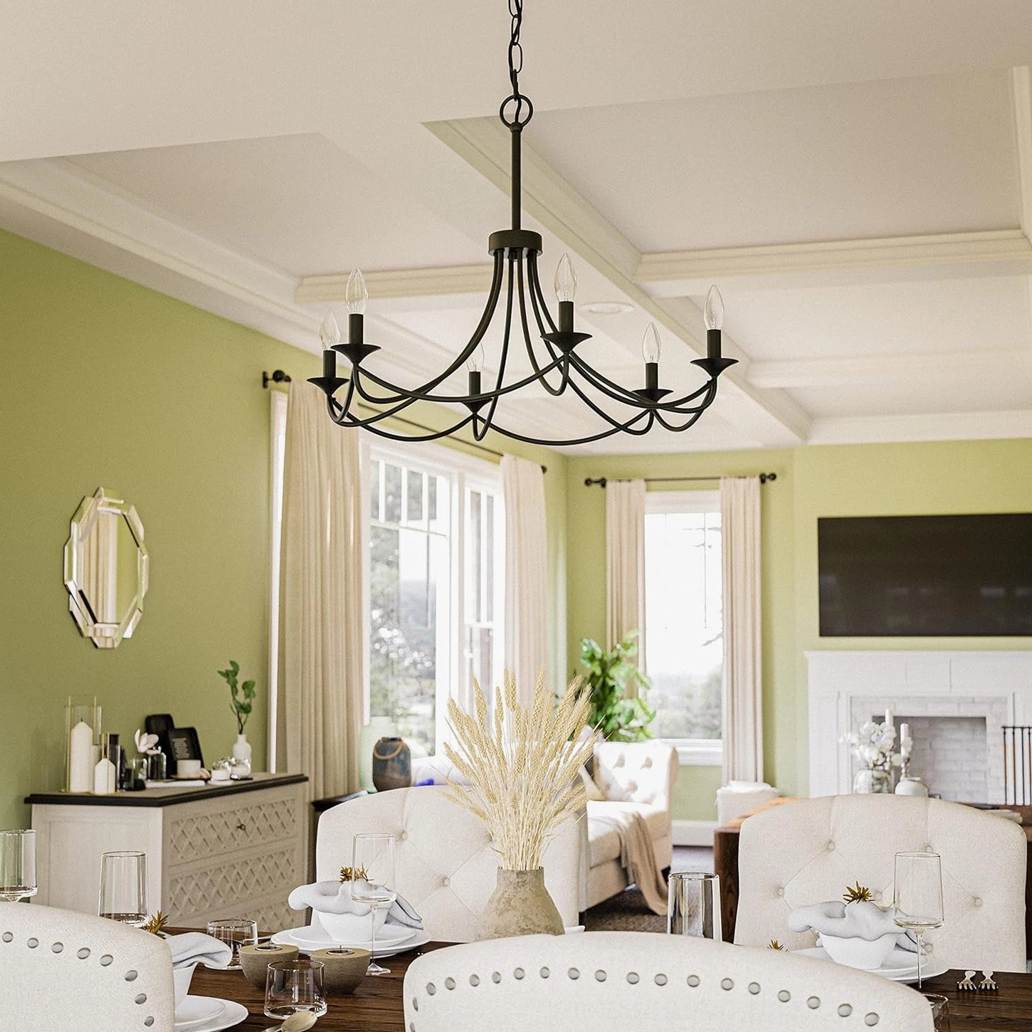 Matte black Ottuso chandelier with six lights in formal dining room with sage green walls and tufted chairs