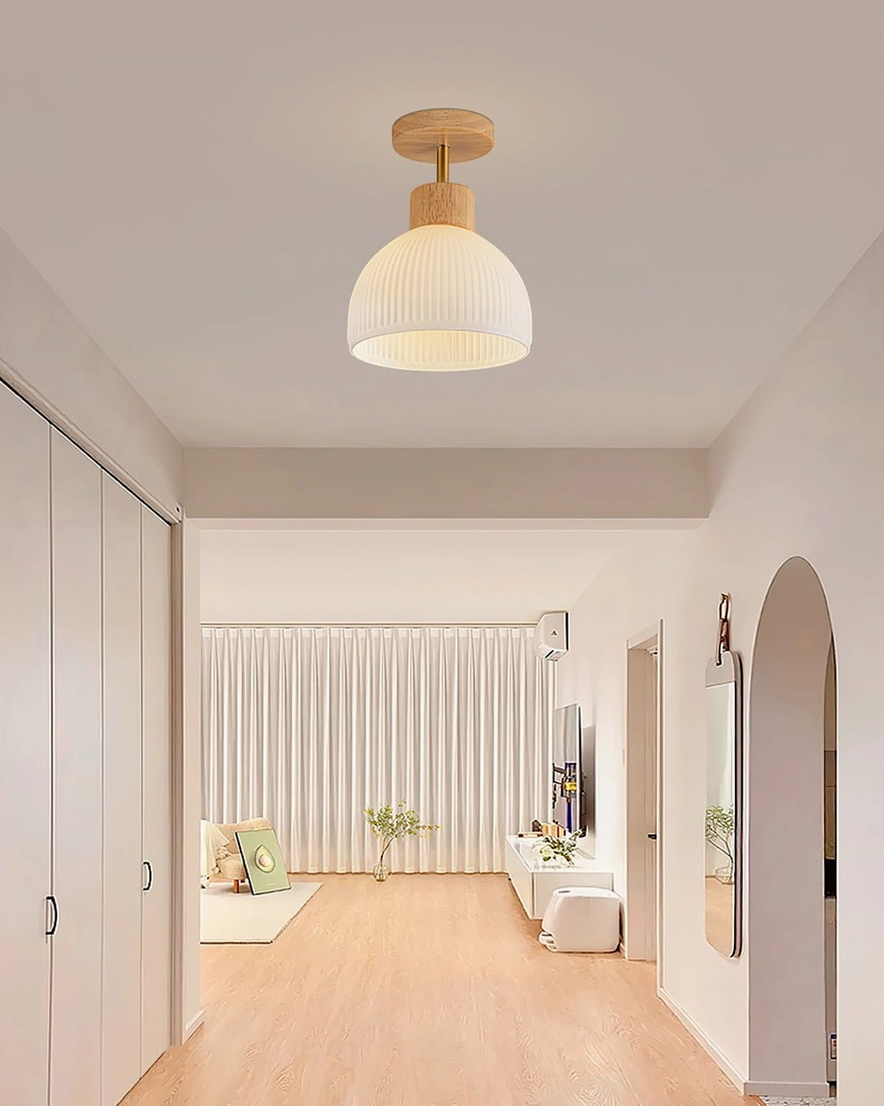 Ribbed ceramic ceiling lamp overhead view, diffused light pattern on ceiling