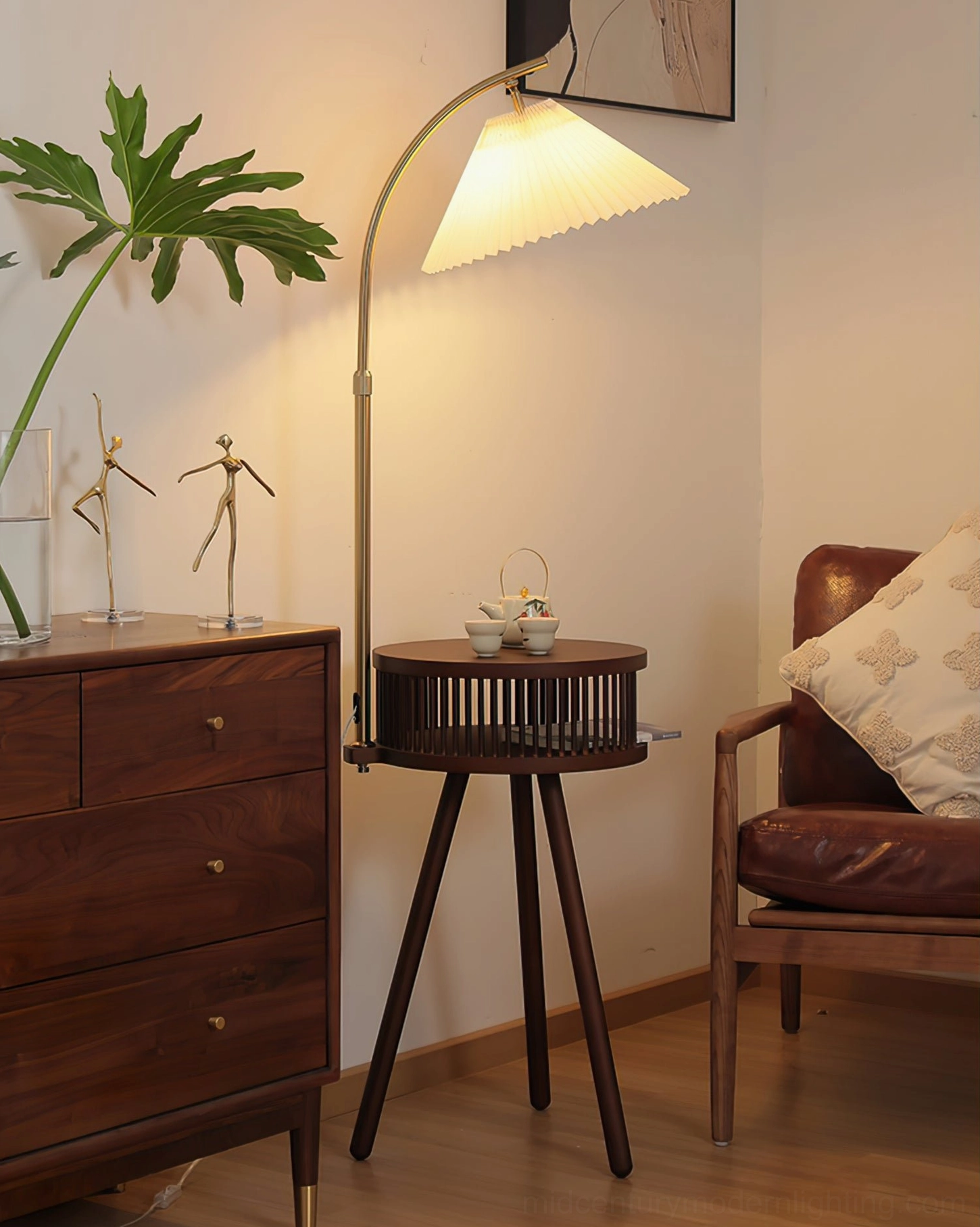 Lit Ozawa mid-century floor lamp with warm yellow glow in contemporary living room interior design