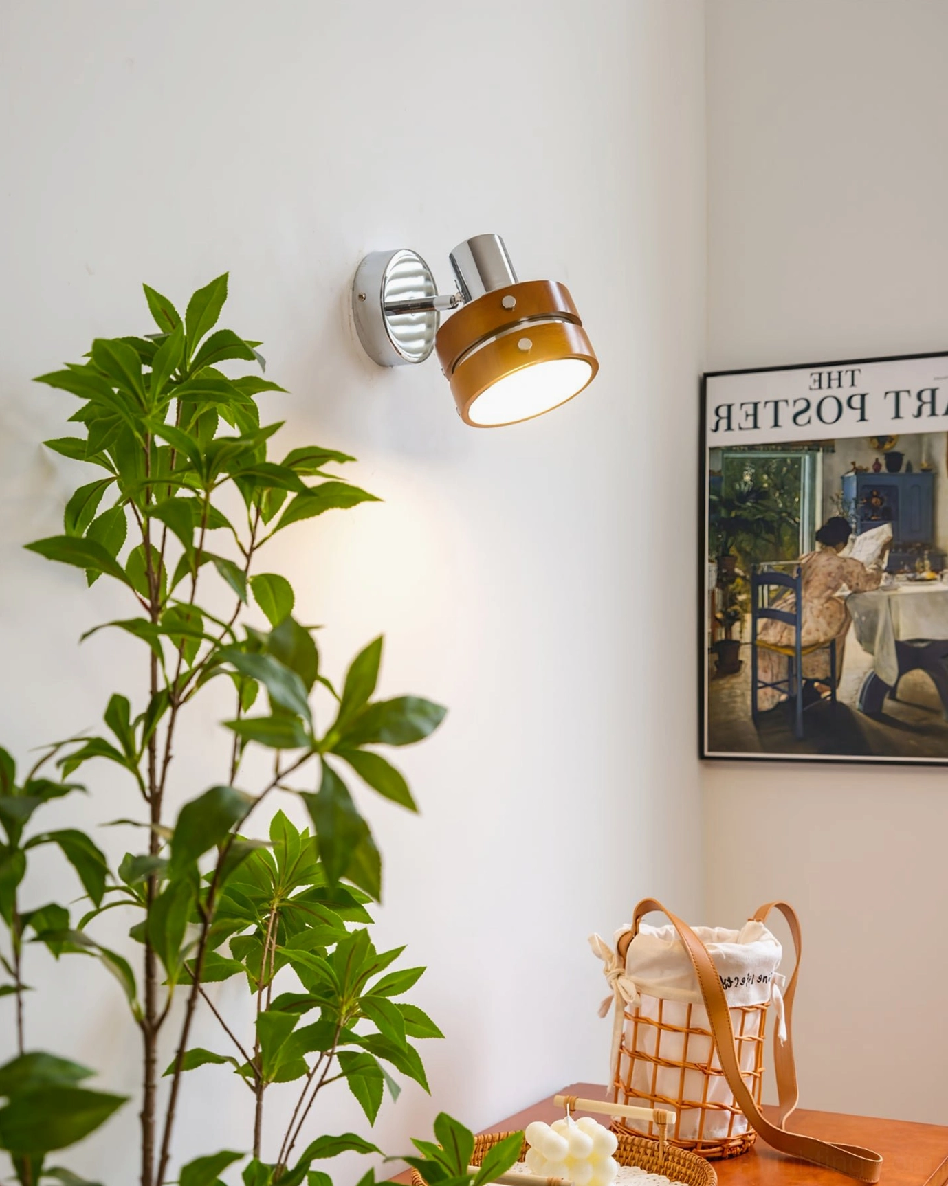 Mid-century modern wall sconce paired in Scandinavian bedroom ambiance