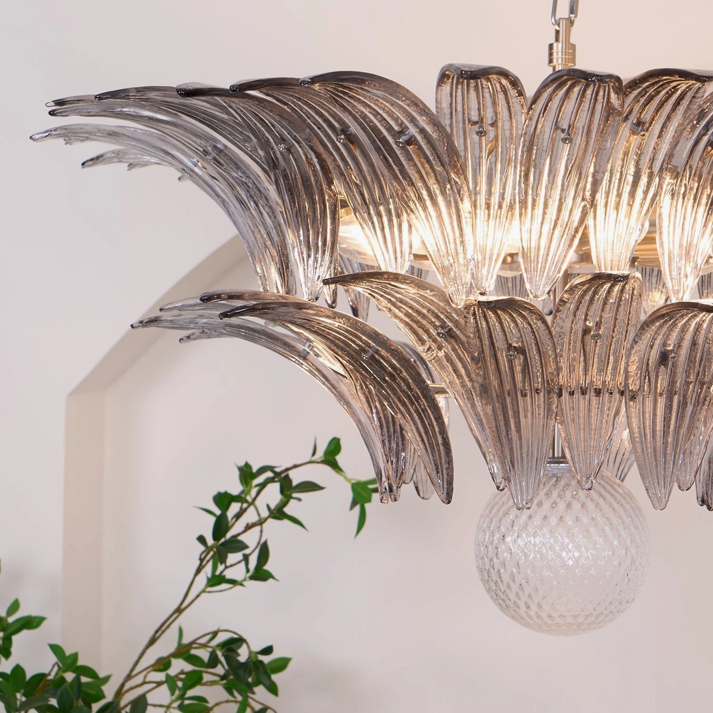 Palazzo Ball Chandelier artistic view of glass leaf formation and metal fixture creating sculptural effect