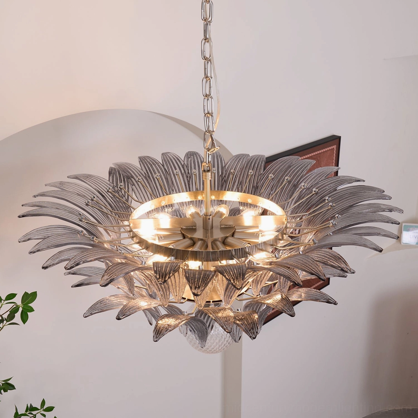 Close-up detail of Palazzo Ball Chandelier glass petals showing craftsmanship and light refraction properties