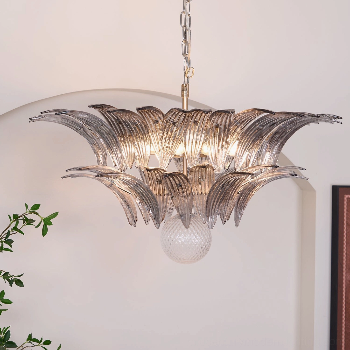 Palazzo Ball Chandelier detail view of glass petal texture and metal mounting in decorative lighting context