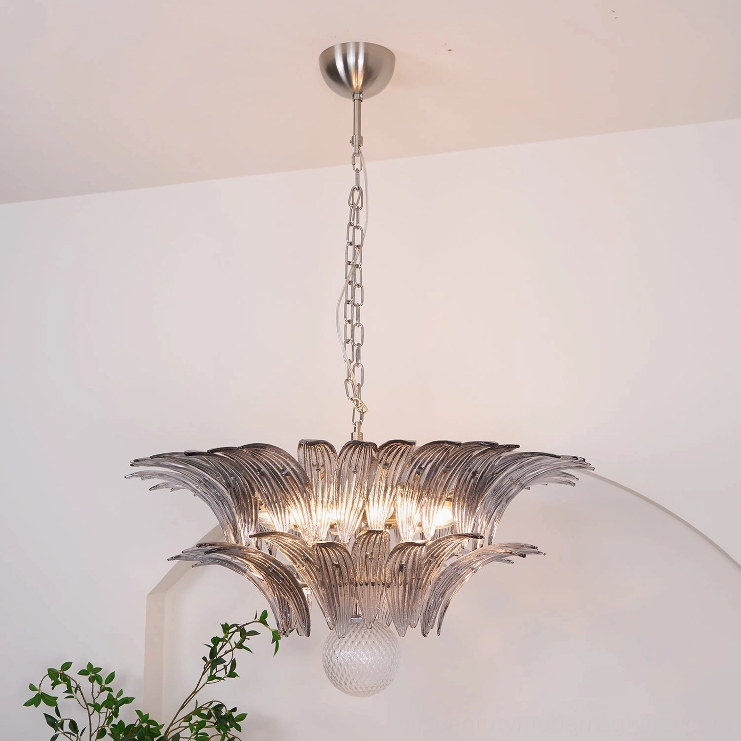 Overhead view of Palazzo Ball Chandelier highlighting radial glass leaf pattern and central frame structure