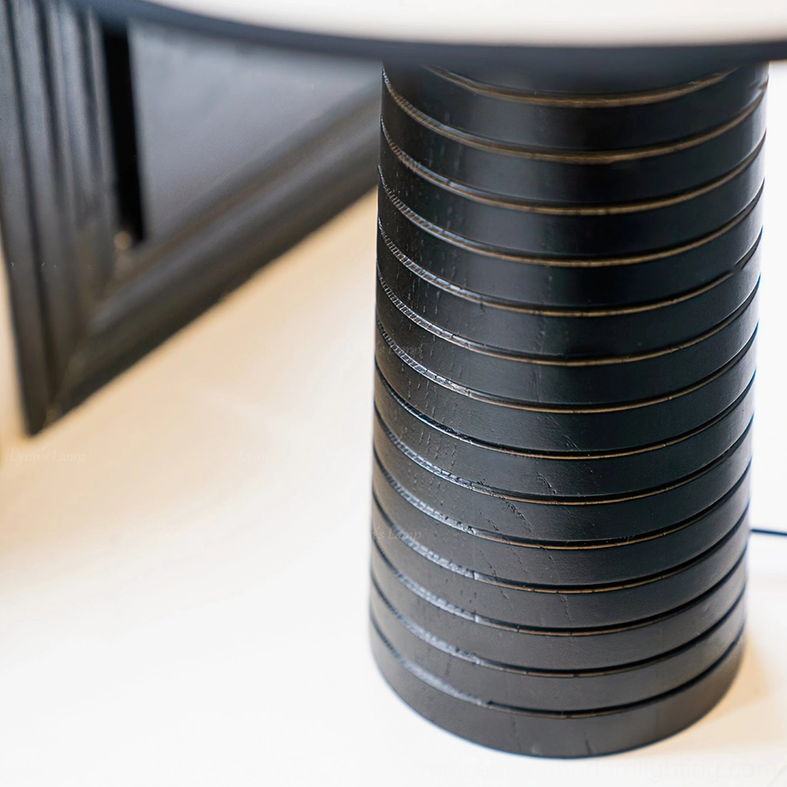 Black Palisades table lamp base with matte ribbed wood finish, close-up front detail