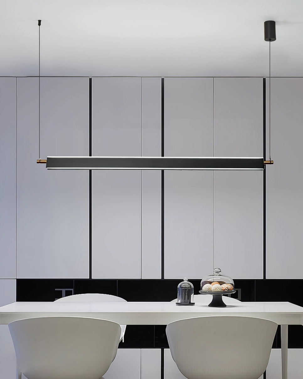 Black minimalist linear chandelier above white dining table in minimalist dining nook - contemporary interior