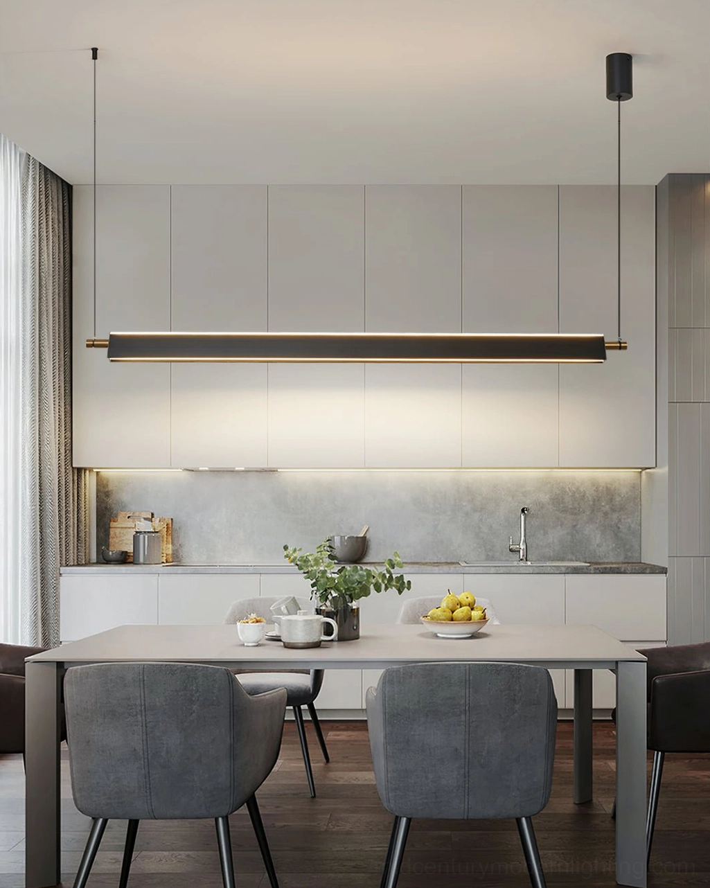Matte black linear pendant chandelier with gold hardware illuminated in open-concept kitchen dining area